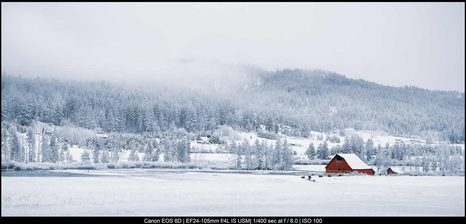 fine art landscape photography red barn and snowy mountains