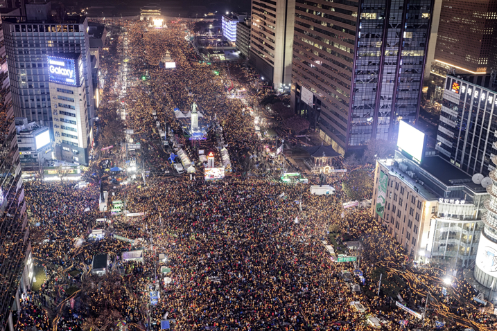 Crowd of people protesting in a city