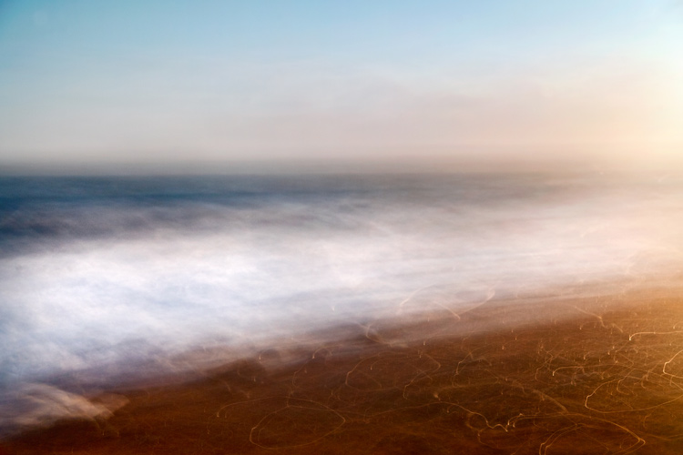 intentional camera movement on a beach