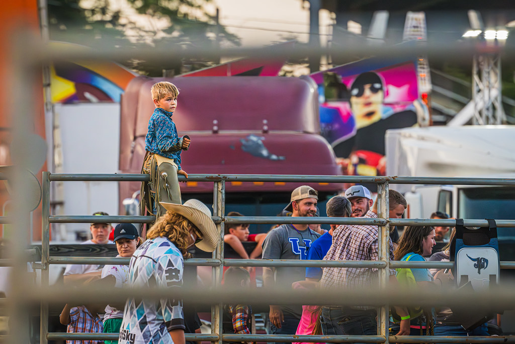 Li'l cowboy above the crowd