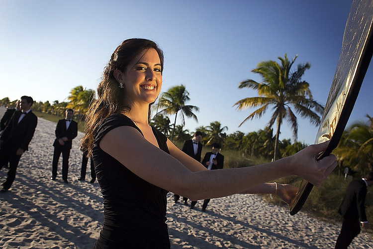 woman holding reflector