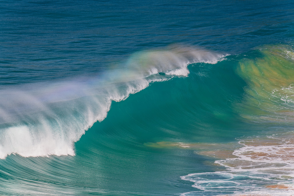 Rainbow light in the Waves at Whale Beach