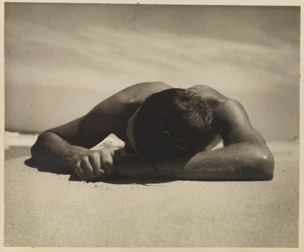 Harold Salvage sunbaking, "The Sunbather" from Camping trips on Culburra Beach by Max Dupain and Olive Cotton