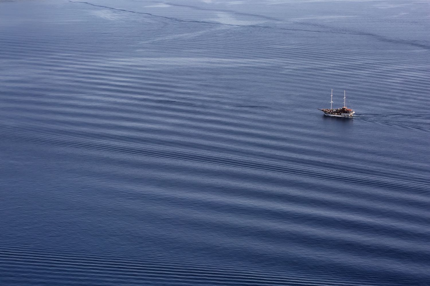 minimalist photography boat on ocean