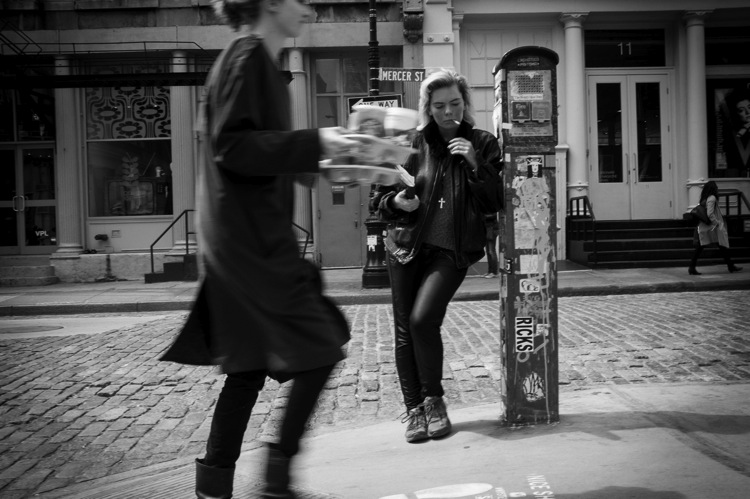 person smoking in Soho