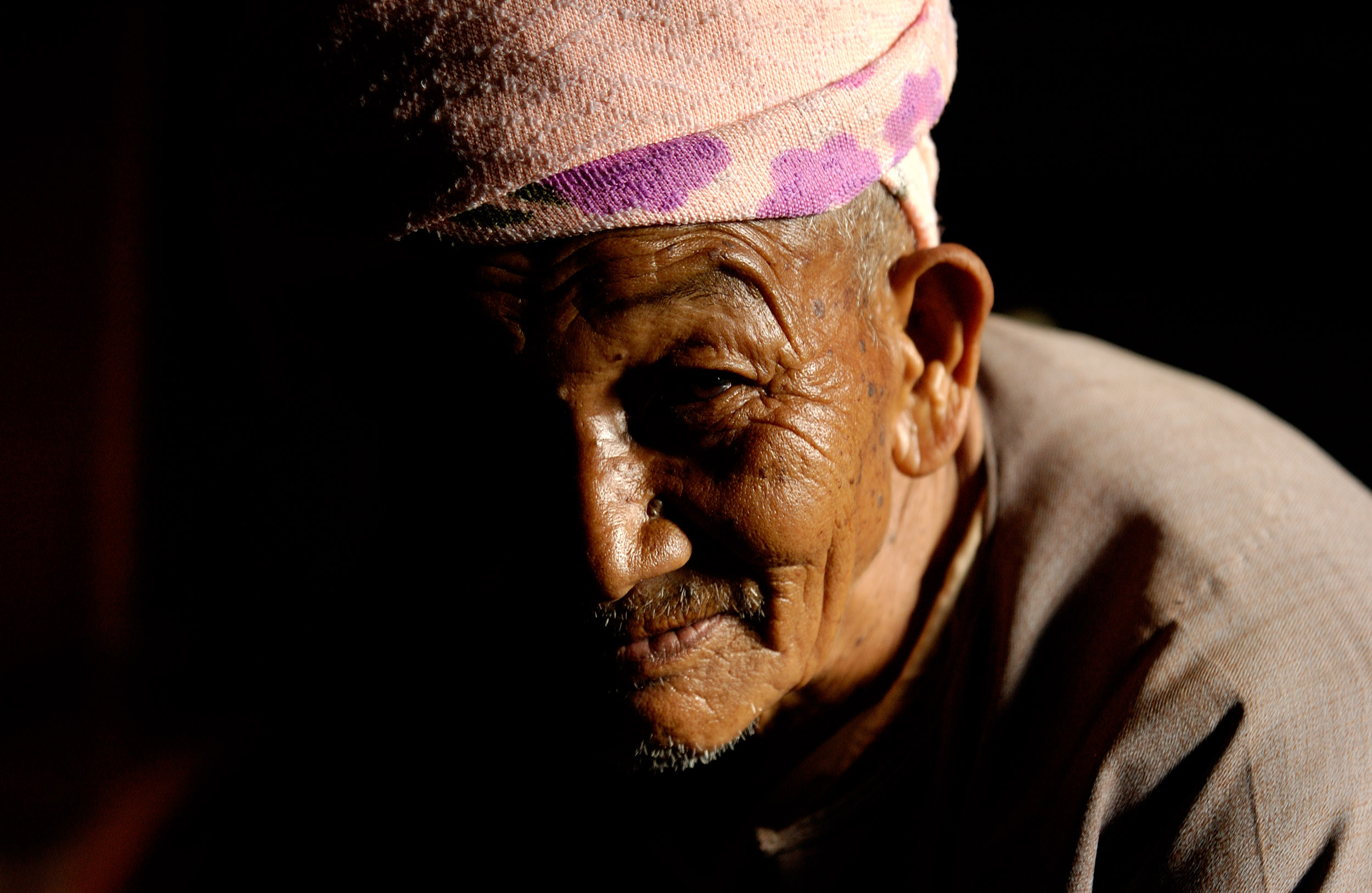 portrait of a senior man with side lighting