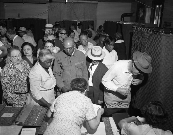 African American and white voters voting together in 1956 - Tallahassee