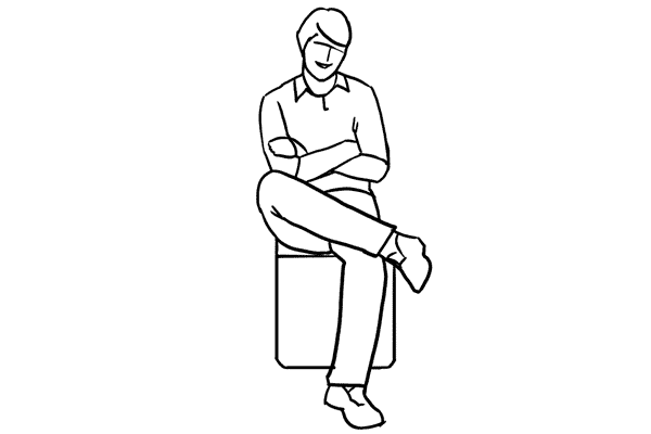 man with arms crossed on a block