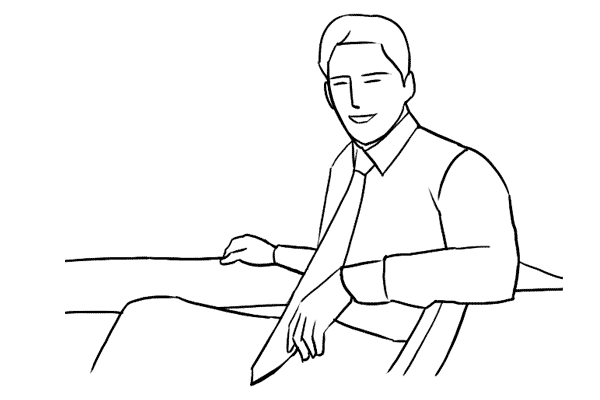 male leaning back in a chair in front of a desk