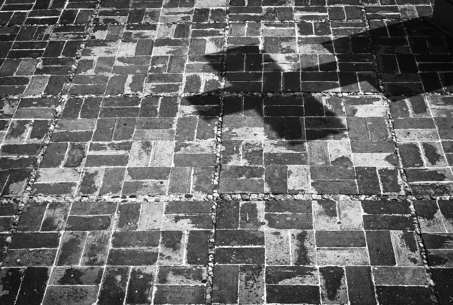 cross on the bricks negative space