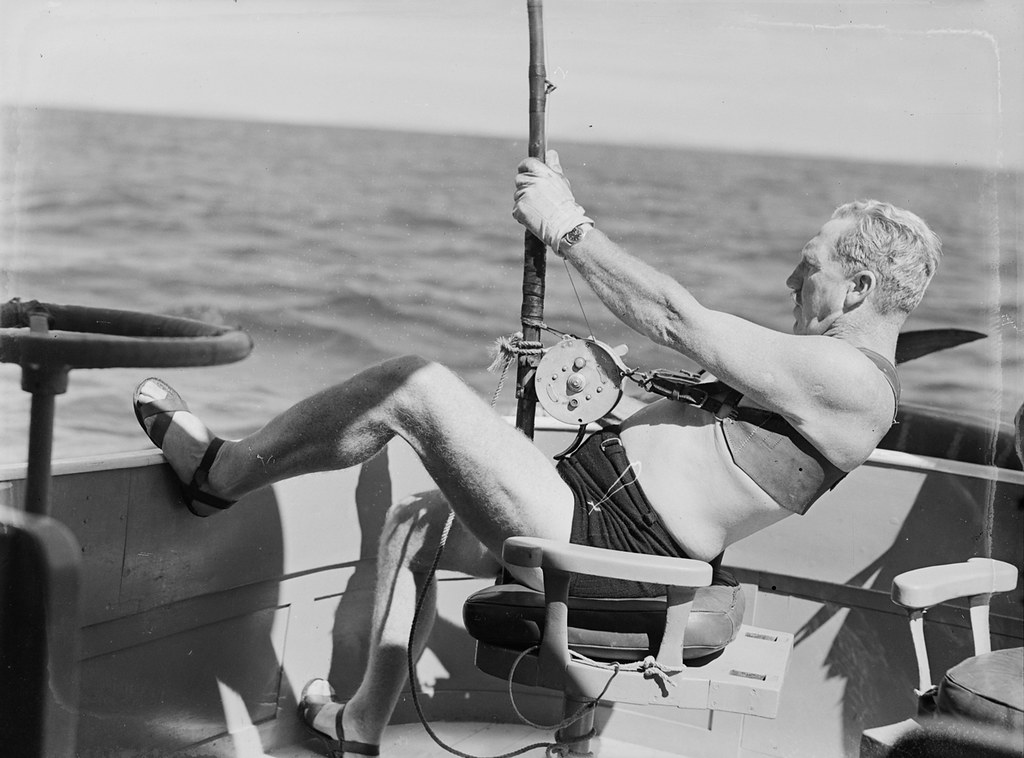 [Portrait of a man fishing on a  boat]