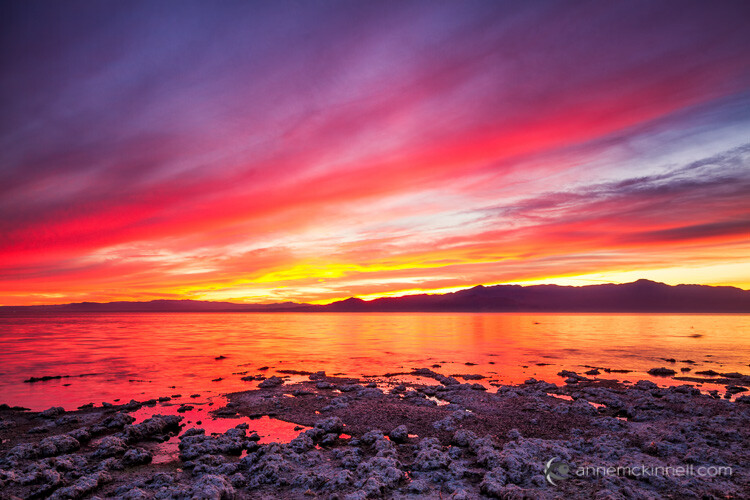 sunset with rocks in the foreground for enhanced depth