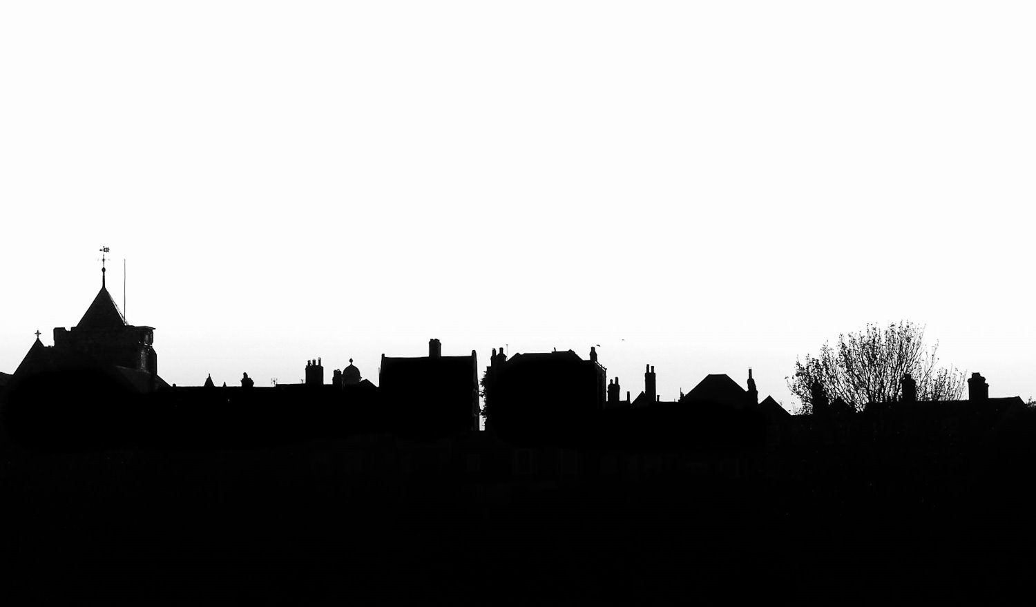 silhouette photography of a rooftop