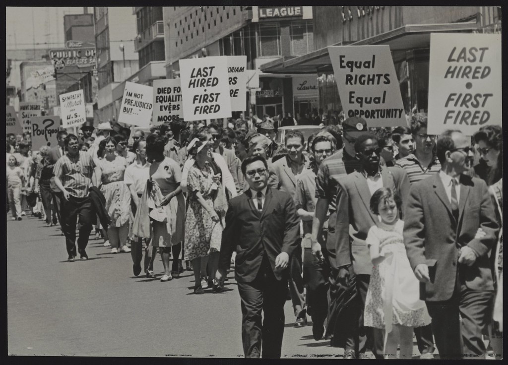 [An estimated 200 activists march down Yonge St. in Toronto in support of integration in Southern United States]