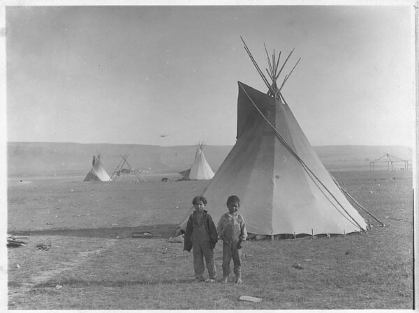 Two Boys in Front of a Tipi
